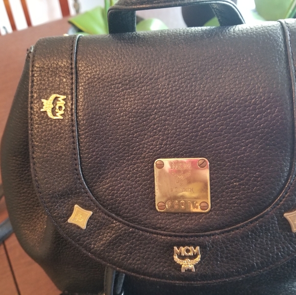 Authentic MCM Studded Black Leather Backpack in excellent used condition. - Picture 2 of 16